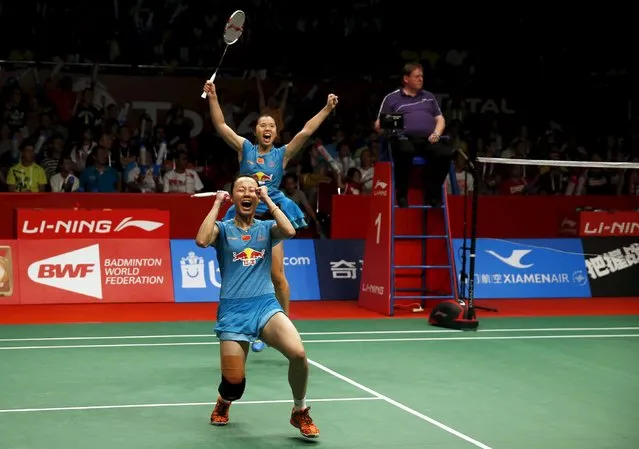 China's Tian Qing and Zhao Yunlei react after beating Denmark's Christinna Pedersen and Kamilla Juhl during their women's double finals badminton match at the BWF World Championships in Jakarta, August 16, 2015. (Photo by Darren Whiteside/Reuters)