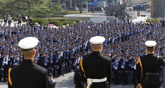 Patriots pay silent tribute for the soldiers from 16 nations who were killed under the U.N. flag during the 1950-53 Korea War at the War Memorial in Seoul, South Korea, 17 October 2024. The 74th memorial service is held for some of 4,500 U.S. soldiers who fell in a fierce battle between U.S. Marines and North Korean and Chinese soldiers near Jangjin Lake in North Korea's South Hamkyong Province during the winter of 1950, in the 1950-53 Korean War. The campaign eventually enabled 100,000 civilians to evacuate from the North Korean port of Hungnam to South Korea. (Photo by Yonhap/EPA)