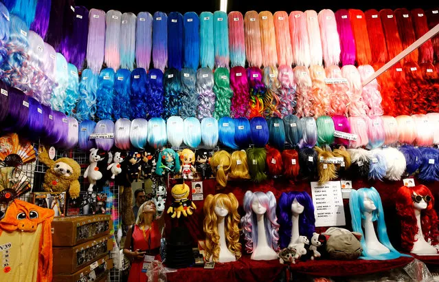 Wigs, in a range of colors and length, are seen on sale at the world's largest computer games fair, Gamescom, in Cologne, Germany August 23, 2017. (Photo by Wolfgang Rattay/Reuters)