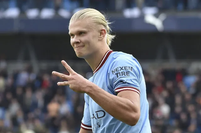 Manchester City's Erling Haaland, celebrates after scoring his side's fifth goal and his personal hat trick during the English Premier League soccer match between Manchester City and Manchester United at Etihad stadium in Manchester, England, Sunday, October 2, 2022. (Photo by Rui Vieira/AP Photo)