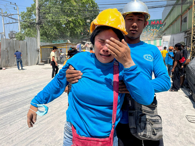 A worker reacts near a site of a collapsed building in Bangkok, Thailand, on March 28, 2025. (Photo by Ann Wang/Reuters)