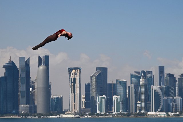 Denmark's Annika Bornebusch competes in the women's high diving round 3 & 4 during the 2024 World Aquatics Championships at Doha Port in Doha on February 14, 2024. (Photo by Oli Scarff/AFP Photo)