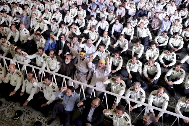 Worshipers shout anti-U.S. and anti-Israel slogans during Friday prayers in Tehran October 2, 2015. (Photo by Raheb Homavandi/Reuters/TIMA)