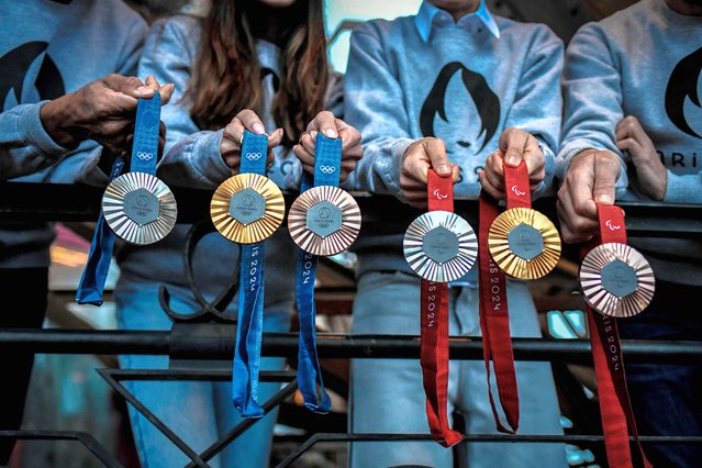 This picture shows upcoming Paris 2024 Olympics medals designed by Fench luxury jewellery house Chaumet, on February 01, 2024 during their presentation at the Eiffel tower in Paris. (Photo by Stephane de Sakutin/AFP Photo)