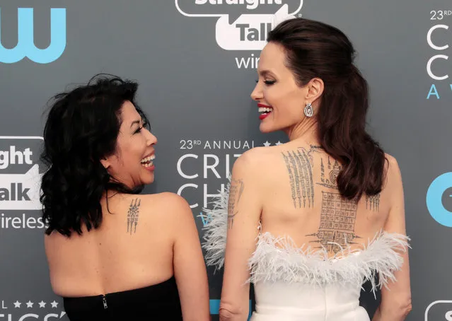 Loung Ung and Angelina Jolie attend the 23rd Annual Critics' Choice Awards at Barker Hangar on January 11, 2018 in Santa Monica, California. (Photo by Monica Almeida/Reuters)