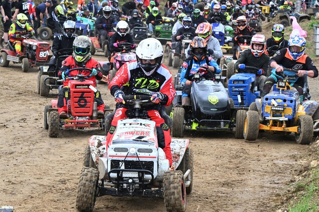 Drivers compete during the 10th edition of the 24 Hours tractor mower endurance race in Les Petites-Armoises, northeastern France, on June 7, 2025. (Photo by Francois Nascimbeni/AFP Photo)