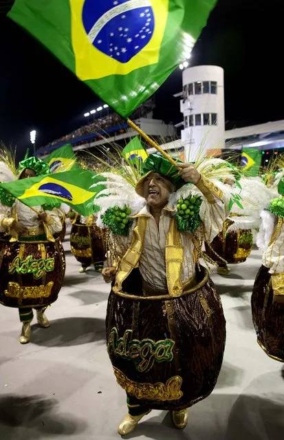 A dancer from the Vai-Vai samba school performs in Sao Paulo. (Photo by Andre Penner/Associated Press)