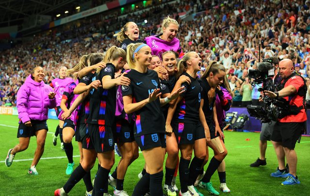 England's Chloe Kelly celebrates scoring their second goal with teammates during the UEFA Women's Euro 2025 semi-final football match between England and Italy at the Stade de Geneve in Geneva, on July 22, 2025. (Photo by Denis Balibouse/Reuters)
