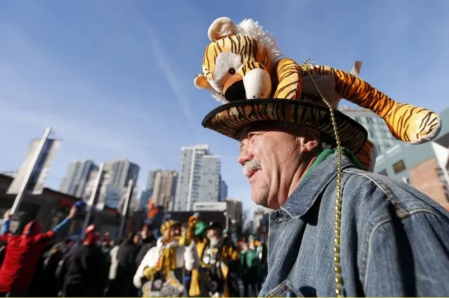 A Hamilton Tiger Cats fan arrives ahead of  the CFL's 102nd Grey Cup football championship between the Calgary Stampeders and the Tiger Cats in Vancouver, British Columbia, November 30, 2014. (Photo by Todd Korol/Reuters)