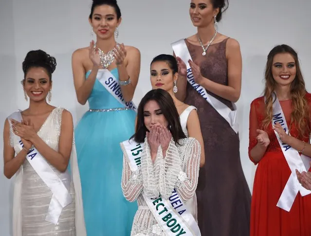 Miss Venezuela Edymar Martinez (C) reacts after winning this year's Miss International beauty pageant in Tokyo on November 5, 2015. (Photo by Toru Yamanaka/AFP Photo)