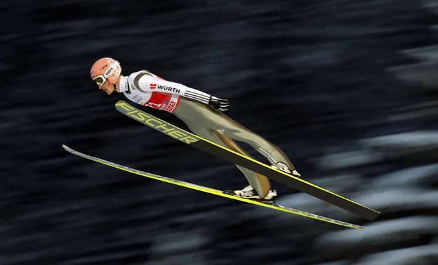 Severin Freund from Germany soars through the air during the trial round for the first jumping of the 63rd four-hills ski jumping tournament in Oberstdorf, southern Germany, December 27, 2014. (Photo by Michael Dalder/Reuters)