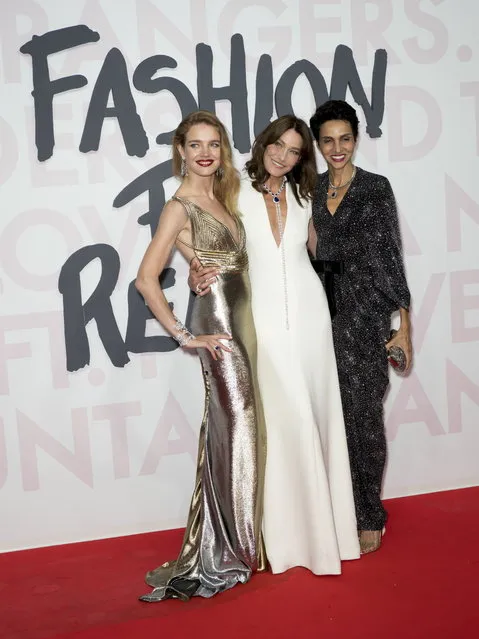 (L-R) Natalia Vodianova, Carla Bruni and Farida Khelfa attend Fashion For Relief during the 71st annual Cannes Film Festival at Hangar 16 Airport of Cannes Mandelieu in Cannes, France, 13 May 2018. (Photo by Arnold Jerocki/EPA/EFE)