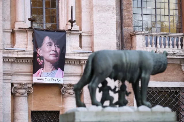 The portrait of deposed Myanmar leader Aung San Suu Kyi is exposed in solidarity in Rome's Campidoglio Capitol Hill, Tuesday, March 16, 2021. Myanmar's ruling junta has declared martial law in a wide area of the country's largest city Yangon, as security forces killed dozens of protesters over the weekend in an increasingly lethal crackdown on resistance to last month's military coup. (Photo by Mauro Scrobogna/LaPresse via AP Photo)
