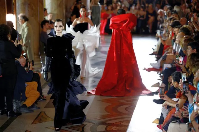 Models present creations by designer Stephane Rolland as part of his Haute Couture Fall/Winter 2023-2024 collection show at the Opera Garnier in Paris, France on July 4, 2023. (Photo by Sarah Meyssonnier/Reuters)