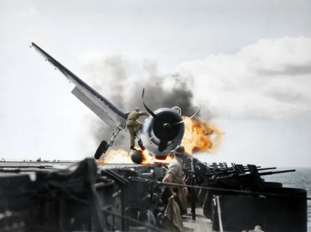 Crash landing of a F6F-3 (Hellcat) onto USS Enterprise (CV-6), Pacific Ocean, 1943.