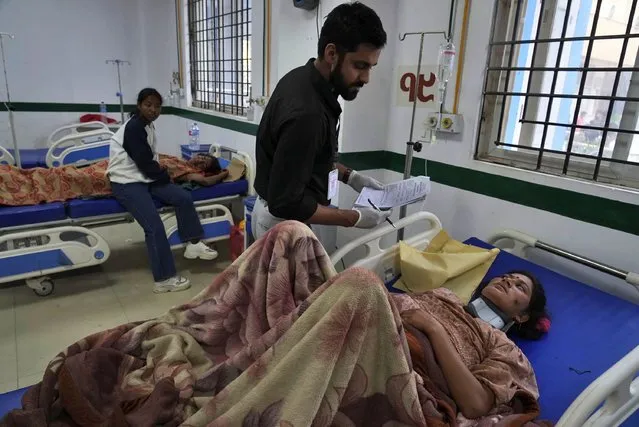 An earthquake victim receives treatment at Bheri hospital in Nepalgunj, Nepal, Saturday, November 4, 2023. (Photo by Niranjan Shrestha/AP Photo)