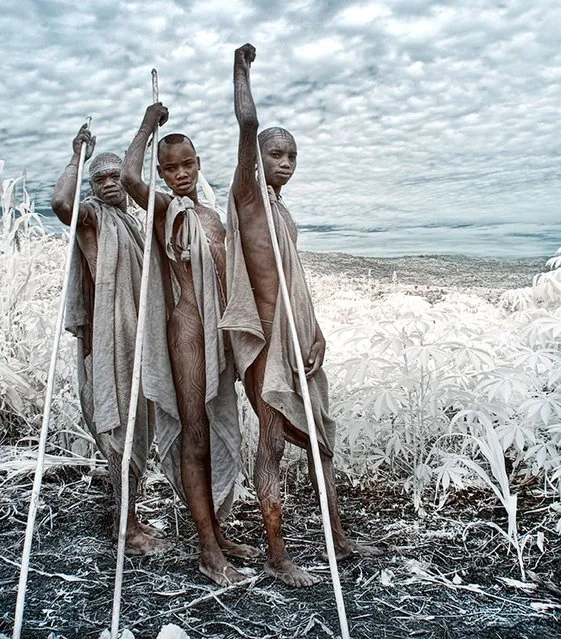 “Young men from the Kara Tribe, Omo, Ethiopia”. This image portrays the tradition of painting the body in Kara tribe. (Photo by Louise Porter/2014 Sony World Photography Awards)