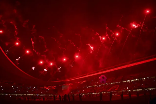 Fireworks light the sky during the opening ceremony of the Arab Club Championship football match between Saudi's Al-Hilal and Tunisia's Etoile Du Sahel at the Hazza Bin Zayed Stadium in the Emirates city of Al Ain on April 18, 2019. (Photo by Giuseppe CACACE / AFP)
