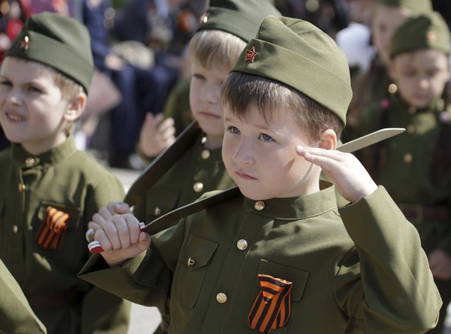 Boys dressed in a historical military uniform attend the so-called parade of children's troops in Rostov-on-Don, southern Russia, May 14, 2015. (Photo by Eduard Korniyenko/Reuters)