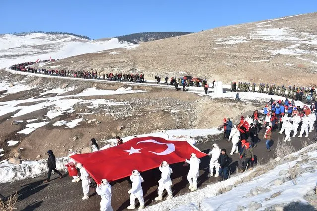 Turkish soldiers and people march to commemorate the fallen WWI soldiers of the World War I Battle of Sarikamis during the 107th anniversary of the Sarikamis operation in Kars, Turkiye on January 09, 2022. (Photo by Huseyin Demirci/Anadolu Agency via Getty Images)