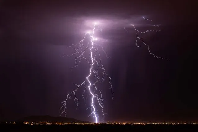 Heavy Lightning strikes down just to the south of Casa Grande in July 2013. (Photo by Mike Olbinski/Barcroft Media)