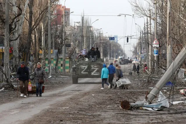 A view shows a street, which was damaged during Ukraine-Russia conflict in the southern port city of Mariupol, Ukraine on April 17, 2022. (Photo by Alexander Ermochenko/Reuters)