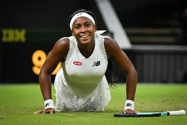 US player Coco Gauff reacts after sliping on the court while playing against Romania's Mihaela Buzarnescu during their women's singles tennis match on the fourth day of the 2022 Wimbledon Championships at The All England Tennis Club in Wimbledon, southwest London, on June 30, 2022. (Photo by Glyn Kirk/AFP Photo)