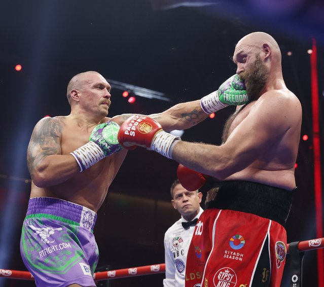 Oleksandr Usyk and Tyson Fury during their bout as part of Oleksandr Usyk v Tyson Fury 2 at Kingdom Arena on December 21, 2024 in Riyadh, Saudi Arabia. (Photo by Richard Pelham/Getty Images)
