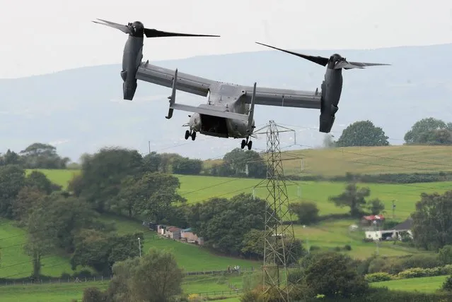 A demonstration of a Bell Boeing V-22 Osprey American multi-mission, military, tiltrotor aircraft on the final day of the summit at the Celtic Manor Resort in Newport, south Wales, on September 5, 2014. (Photo by Stefan Rousseau/PA Wire)