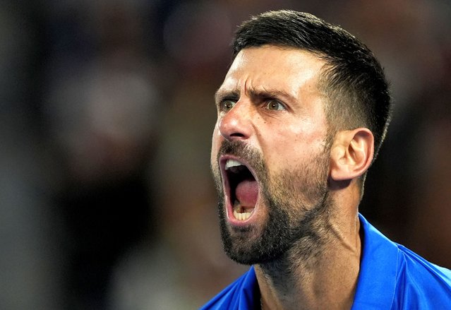 Novak Djokovic of Serbia reacts after winning a point against Tomas Machac of the Czech Republic during their third round match at the Australian Open tennis championship in Melbourne, Australia, Friday, January 17, 2025. (Phoot by Asanka Brendon Ratnayake/AP Photo)