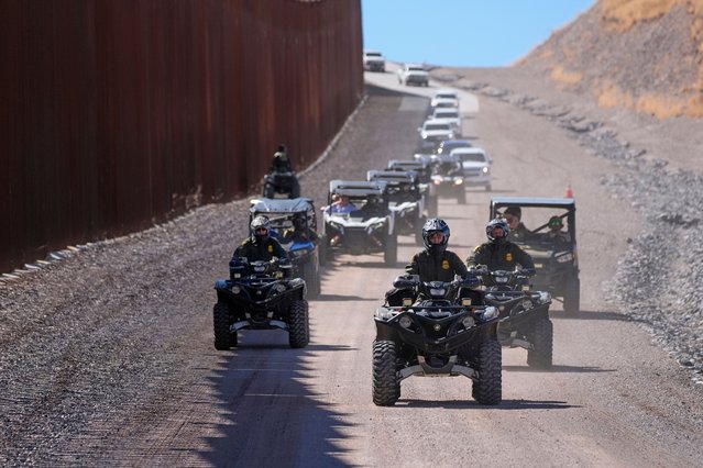 Homeland security secretary Kristi Noem (centre) rides a four-wheeler during a tour along the Nogales border wall in Arizona at the Mariposa port of entry on March 16, 2025. (Photo by Alex Brandon/AP Photo)