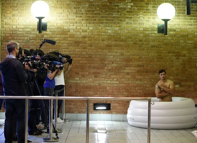 France's outside centre Amexandre Dumoulin (R) attends a recovery session at the Selsdon Park Hotel in Croydon, south London, on September 24, 2015, following the team's 2015 Rugby World Cup fixture against Romania. France won the match 38-11. (Photo by Franck Fife/AFP Photo)