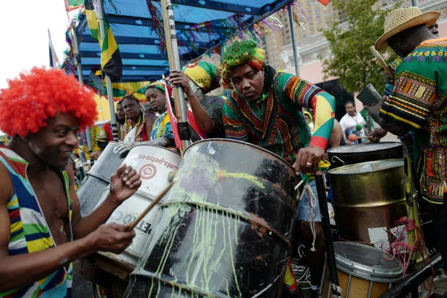 People on a parade float play music during J'Ouvert, ahead of the annual West Indian-American Carnival Day Parade in Brooklyn, NY, U.S. September 5, 2016. (Photo by Mark Kauzlarich/Reuters)
