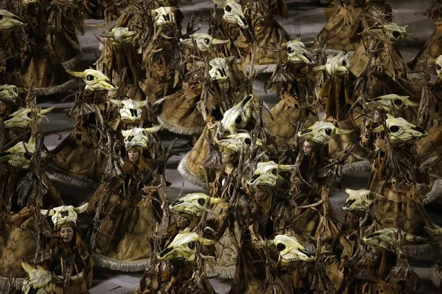 Revellers from the Vila Isabel samba school participate in the annual Carnival parade in Rio de Janeiro's Sambadrome February 12, 2013. (Photo by Ricardo Moraes/Reuters)