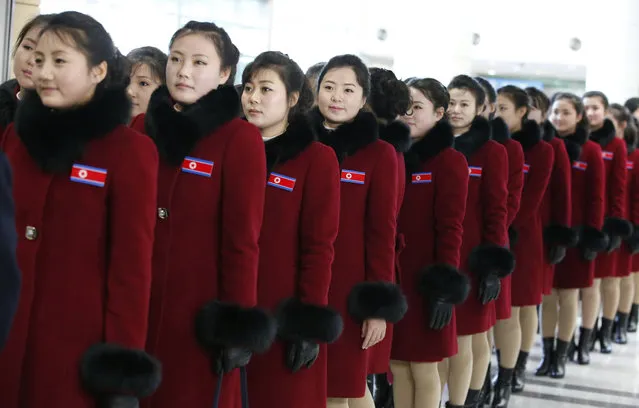 North Korean cheering squads members arrive at the inter-Korea transit office to leave for North Korea after attending the Pyeongchang Winter Olympic Games in Paju near the Demilitarized Zone, South Korea, Monday, February 26, 2018. (Photo by Kim Hee-Chul/Pool Photo via AP Photo)