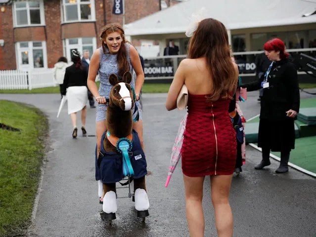 Racegoers arrive for Ladies Day at the Grand National Festival at Aintree Racecourse on April 13, 2018 in Liverpool, England. (Photo by Darren Staples/Reuters)