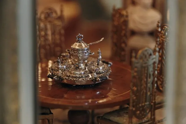 Miniature silverware is shown in the "formal dining room" of the Astolat Castle, a 3 metre (9 foot) tall dollhouse, currently on display in New York November 14, 2015. (Photo by Lucas Jackson/Reuters)