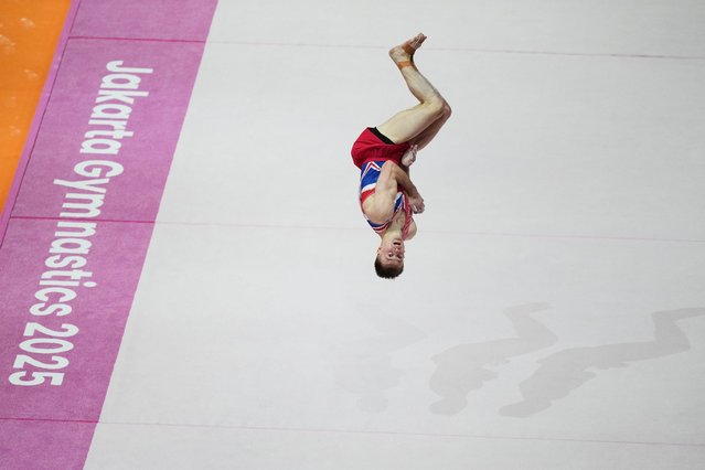 Luke Whitehouse of Britain competes in the men's floor exercise final during the 53rd Artistic Gymnastics World Championships in Jakarta, Indonesia, Friday, October 24, 2025. (Photo by Achmad Ibrahim/AP Photo)