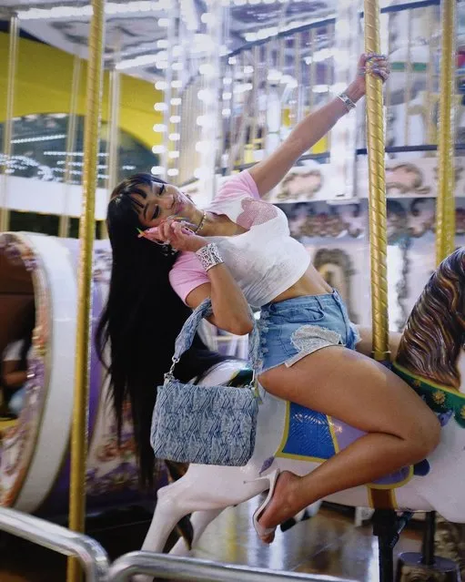 American rapper Diamonté Quiava Valentin Harper, known professionally as Saweetie lets loose on a carousel in the last decade of April 2023. (Photo by saweetie/Instagram)