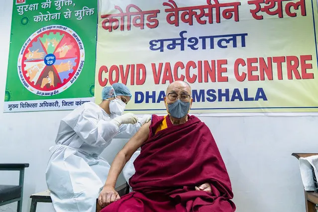 This photograph provided by Office of his Holiness the Dalai Lama shows the Tibetan spiritual leader receiving a shot of the COVID-19 vaccine at Zonal Hospital in Dharmsala, India, Saturday, March 6, 2021. (Photo by Office of the his holiness the Dalai Lama via AP Photo)