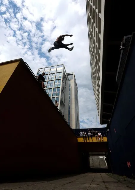 Parkour athlete Jai Smith competes during the annual NEPK Jam at the 55 Degrees North Apartments in Newcastle, Britain on June 25, 2023. (Photo by Lee Smith/Reuters)
