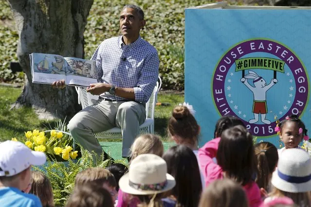 U.S. President Barack Obama acts out a part where the monsters roll their eyes as he reads the storybook “Where the Wild Things Are” during the annual Easter Egg Roll at the White House in Washington April 6, 2015. (Photo by Jonathan Ernst/Reuters)