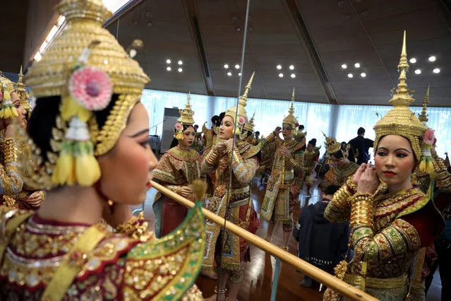 Dancers get ready backstage before a performance of masked theatre known as Khon which was recently listed by UNESCO, the United Nations' cultural agency, as an intangible cultural heritage, along with neighbouring Cambodia's version of the dance, known as Lakhon Khol at the Thailand Cultural Centre in Bangkok, Thailand on November 7, 2018. (Photo by Jorge Silva/Reuters)