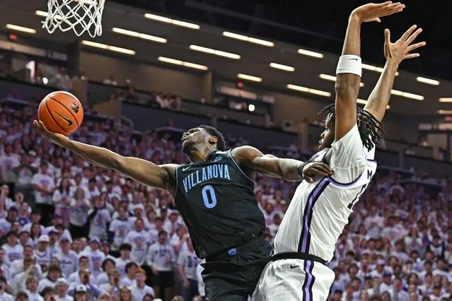 TJ Bamba #0 of the Villanova Wildcats drives to the basket against Will McNair Jr. #13 of the Kansas State Wildcats in the first half at Bramlage Coliseum on December 5, 2023 in Manhattan, Kansas. (Photo by Peter Aiken/Getty Images)