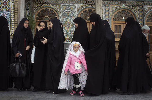 Voters line up to cast their ballots at a polling station in the city of Qom, Iran. Elections for Iran's parliament (Majlis) and Assembly of Experts kicked off on Friday, February 26, 2016. (Photo by Ahmad Halabisaz/Xinhua via ZUMA Wire)