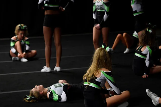 Competitors rest in the warm up area during the Legacy Super Regional Cheer and Dance Championships at Copperbox Arena, Queen Elizabeth Olympic Park in London, Britain, February 19, 2017. (Photo by Toby Melville/Reuters)
