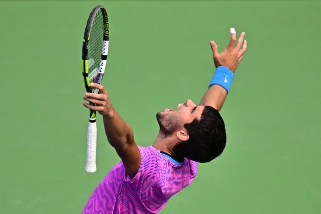 Spain's Carlos Alcaraz reacts after winning match point against Russia's Daniil Medvedev in the ATP-WTA Indian Wells Masters men's final tennis match at the Indian Wells Tennis Garden in Indian Wells, California, on March 17, 2024. (Photo by Frederic J. Brown/AFP Photo)