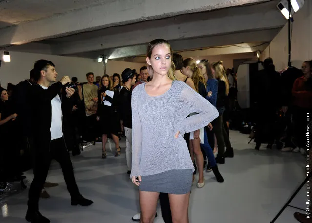 Models backstage before the House of Holland show during London Fashion Week Spring/Summer 2012
