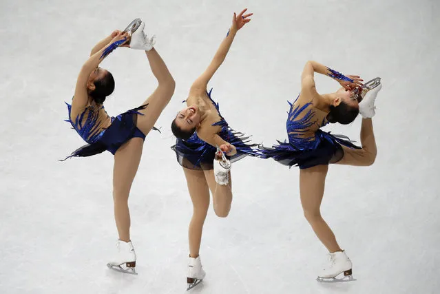 Japan's Mao Asada competes during the women's free program at the ISU World Figure Skating Championships in Saitama, north of Tokyo, March 29, 2014. Picture taken with multiple exposure. (Photo by Issei Kato/Reuters)