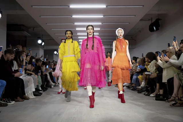 Models wear creations by Bora Aksu at the Spring/Summer 2020 fashion week runway show in London, Friday, September 13, 2019. (Photo by Grant Pollard/Invision/AP Photo)